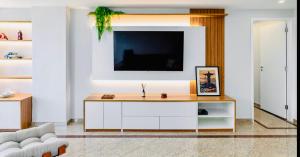 Телевизор и/или развлекательный центр в Maravilhoso apartamento na orla da Barra da Tijuca