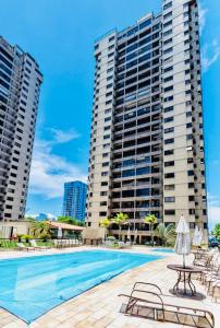 Бассейн в Maravilhoso apartamento na orla da Barra da Tijuca или поблизости