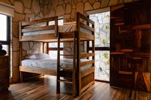 Krevet ili kreveti na kat u jedinici u objektu Quinta Majam