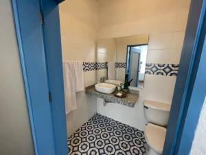 A bathroom at BLUE HOUSE - Beachfront Luxury House with 8 Bedrooms