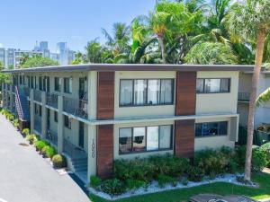 an exterior view of a building with palm trees at Bay Harbor Unit 4 Perfect 2 Bed 1 Bathprime Lo in Miami Beach