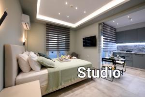 A television and/or entertainment centre at Adell Deluxe Apartments