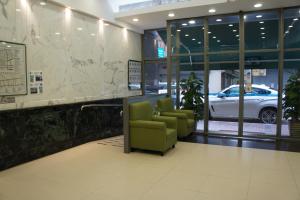 The lobby or reception area at West Inn