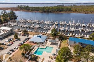 an aerial view of a marina with boats at Harbourside Hideout in New Bern