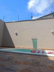 a pool on the floor of a building at Pousada Donatella in Paranaguá