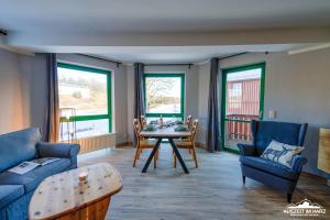 Χώρος καθιστικού στο Auszeit-im-Harz Haus 5 Wohnung 22 +11 φωτογραφίες