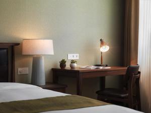 Letto o letti in una camera di Yusense Hotel