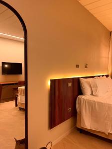 Cama ou camas em um quarto em Pousada Yamandu - Piscinas Aquecidas