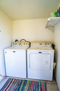 two appliances sitting next to each other in a kitchen at A Special Retreat on a Mini-Farm -- in SMTX in San Marcos