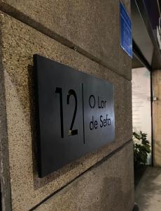 a sign on the side of a building at LAR DE SEFA in Redondela