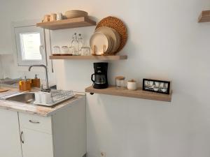 Кухня или мини-кухня в CASA ELEO
