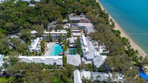 an aerial view of the resort and the beach at Elysium The Beach Club in Palm Cove