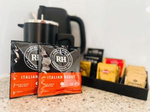 two packages of italian roast coffee sitting on a counter at Kurow Motel in Kurow