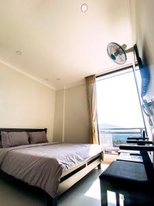 Postel nebo postele na pokoji v ubytování BING BONG HOTEL