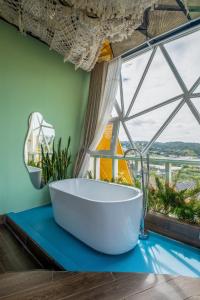 Fotografie z fotogalerie ubytování Orimi Cafe & Homies Dalat v destinaci Xuan An + 42 fotografií