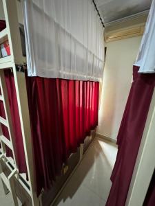 Ένα ή περισσότερα κρεβάτια σε δωμάτιο στο Nua House