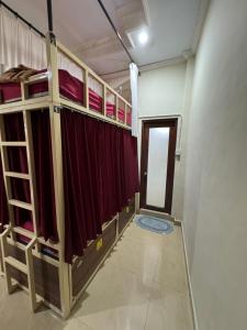 Ένα ή περισσότερα κρεβάτια σε δωμάτιο στο Nua House