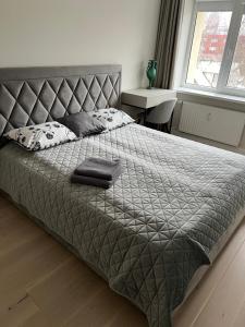 Llit o llits en una habitació de Biliūno apartamentai prie jūros