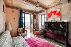 Khu vực ghế ngồi tại Casa Giovanni - Relax Among Greenery - Happy Rentals
