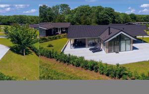 an overhead view of a house with a garden at Three-Bedroom Holiday Home In Sydals in Sarup