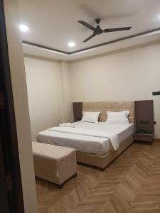 Кровать или кровати в номере Prakhyat