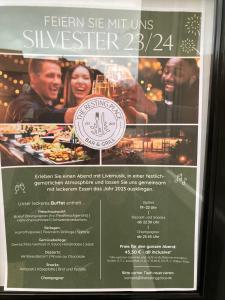 een flyer voor een wijnproeverij met een poster bij The Resting Place in Lemgo
