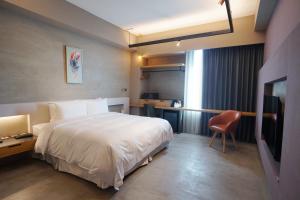 Letto o letti in una camera di Thinker Hotel