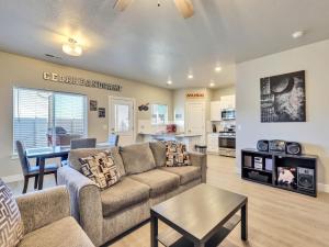 a living room with a couch and a table at Band Camp Town Home in Cedar City