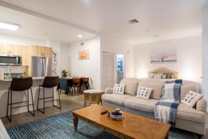 a living room and kitchen with a couch and a table at Cozy Huge LOFT for Live and Work in Los Angeles