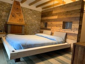 A bed or beds in a room at Agriturismo Tamellini