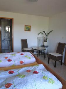 Postel nebo postele na pokoji v ubytování Gasthaus Hingerl