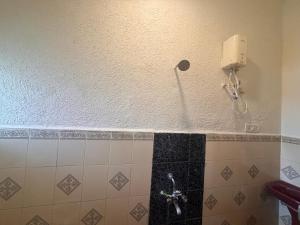 Koupelna v ubytování Hotel Sai Plaza