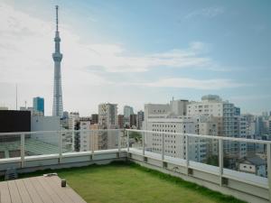a balcony with a view of a city at OTHER SPACE Asakusa in Tokyo