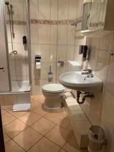 Vonios kambarys apgyvendinimo įstaigoje Hotel am Ledermuseum