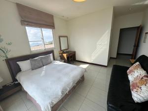 Giường trong phòng chung tại Siangting B&B