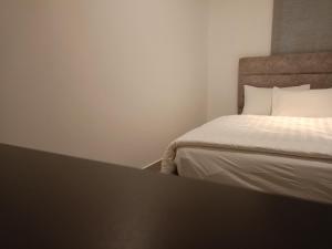 Postel nebo postele na pokoji v ubytování Bayu Temiang Luxury Design 7~8 Pax
