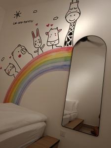 a mirror with a group of cats on a rainbow at Bayu Temiang Luxury Design 7~8 Pax in Seremban