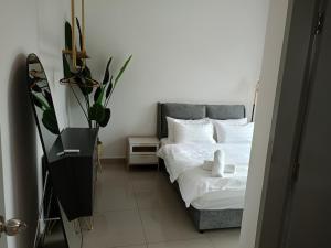 Postel nebo postele na pokoji v ubytování Bayu Temiang Luxury Design 7~8 Pax