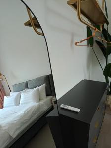 Postel nebo postele na pokoji v ubytování Bayu Temiang Luxury Design 7~8 Pax