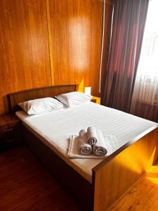 Säng eller sängar i ett rum på Гостиничный комплекс Bal-Meyir