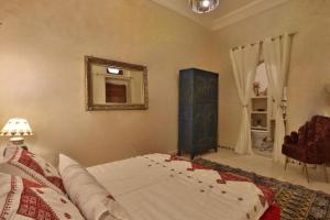 Postel nebo postele na pokoji v ubytování Riad La Fayette Bed & Breakfast