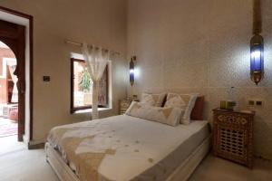 Postel nebo postele na pokoji v ubytování Riad La Fayette Bed & Breakfast