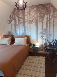 Postel nebo postele na pokoji v ubytování Le Verger (Le Plessis)