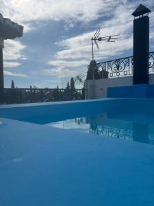 a swimming pool with a view of the sky at Carmen San Luis Albaicin, Granada in Granada