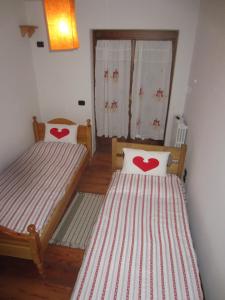 Кровать или кровати в номере Appartamento Serdes Big C2