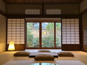 Lova arba lovos apgyvendinimo įstaigoje NIPPONIA HOTEL 伊賀上野 城下町