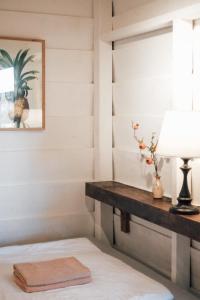 Postel nebo postele na pokoji v ubytování Di House Đà Lạt