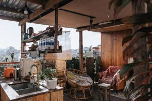 Posezení v ubytování Di House Đà Lạt + 37 fotografií