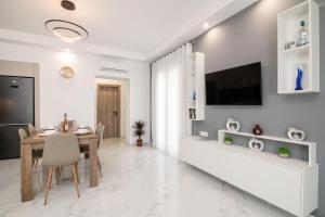 TV a/nebo společenská místnost v ubytování Sonny 2 Bedroom House