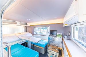 TV a/nebo společenská místnost v ubytování glampark FREE AND EASY CAMP RESORT　三重県